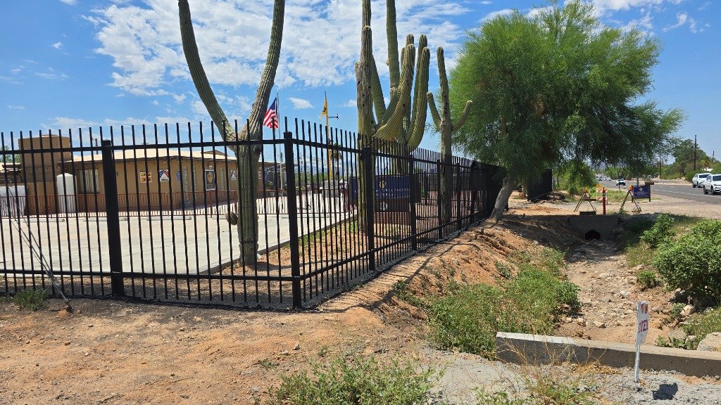 Metal perimeter fence repainting and restoration